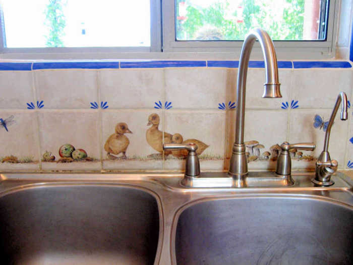 European Style Country Kitchen ducklings portrait. Vignette of adorable ducklings behind kitchen sink faucet. Painted by Julia Sweda.