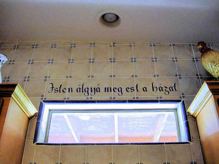 European Style Country Kitchen saying of...Bless This House...in the Hungarian language.
