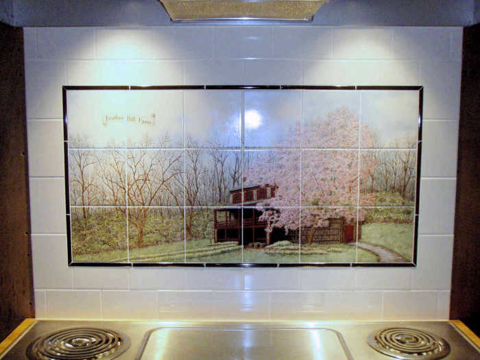 Feather Hill Farm painted tile backsplash mural, installed behind stove as a backsplash.