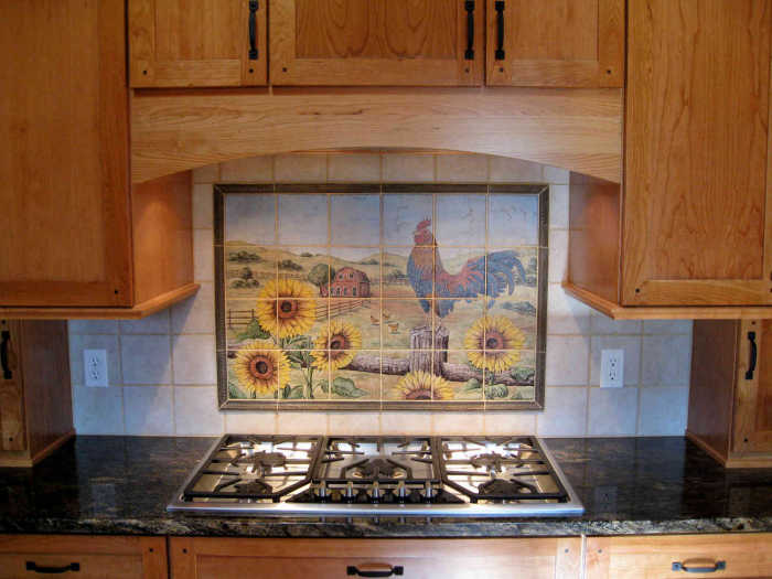 Harrells Farm Rooster tile mural. Installed as a backsplash with a dark border trim that matches the kitchen decor.