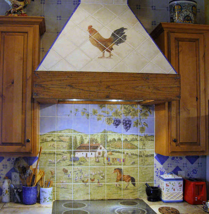 Rooster portrait featured on stove hood vent. Artist Julia Sweda.