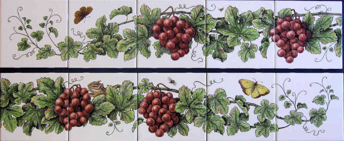 Beverlys Grapevines Garden tile mural 4, with grapevines bearing clusters of red grapes, honeybees, chipmunk eating red grapes and butterflies. Hand painted tile art by Julia Sweda.