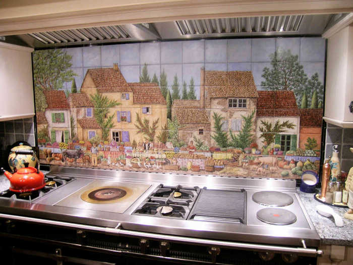 Provence Street Market backsplash tile mural. Mural installed behind stove shows entire painting. Artist Julia Sweda.