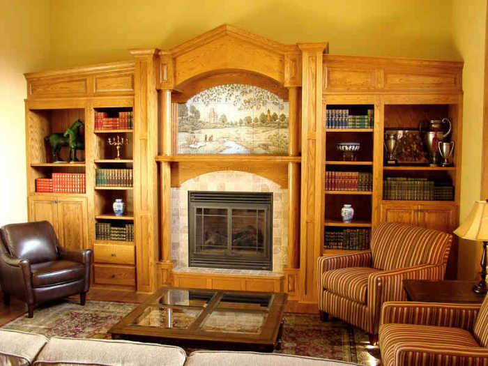 English Countryside British Teddies tile mural. Mural installed above fireplace with adjoining bookshelves. Artist Julia Sweda.