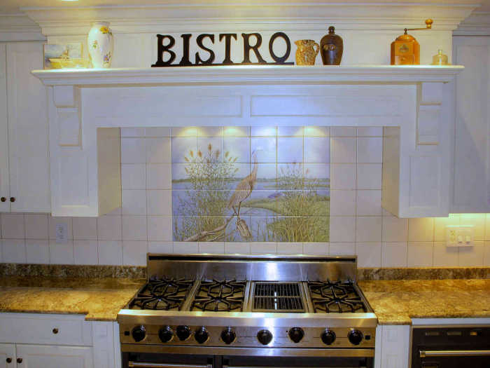 Great Blue Heron in Heron Cove, Old Lyme Connecticut River vicinity. Tile mural installed as a kitchen backsplash. Artist Julia Sweda.