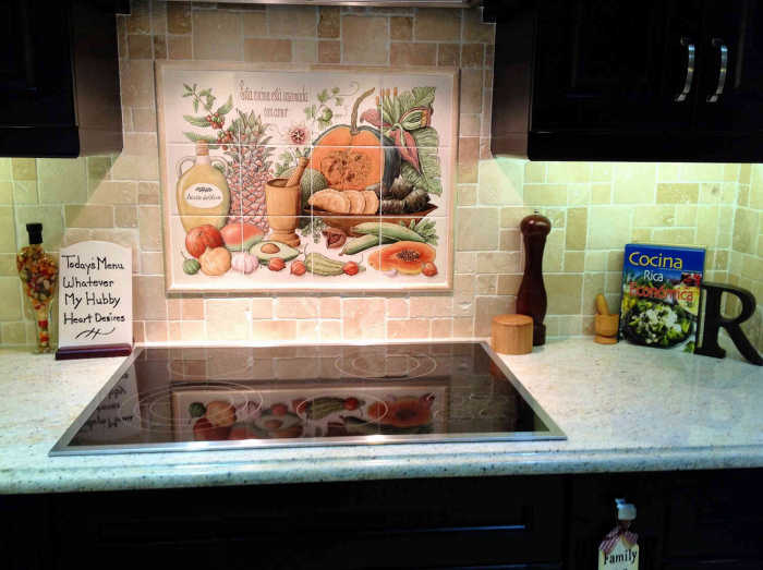 Cookies Puerto Rican Bounty painted tile mural installed in kitchen as a backsplash. Artist Julia Sweda.